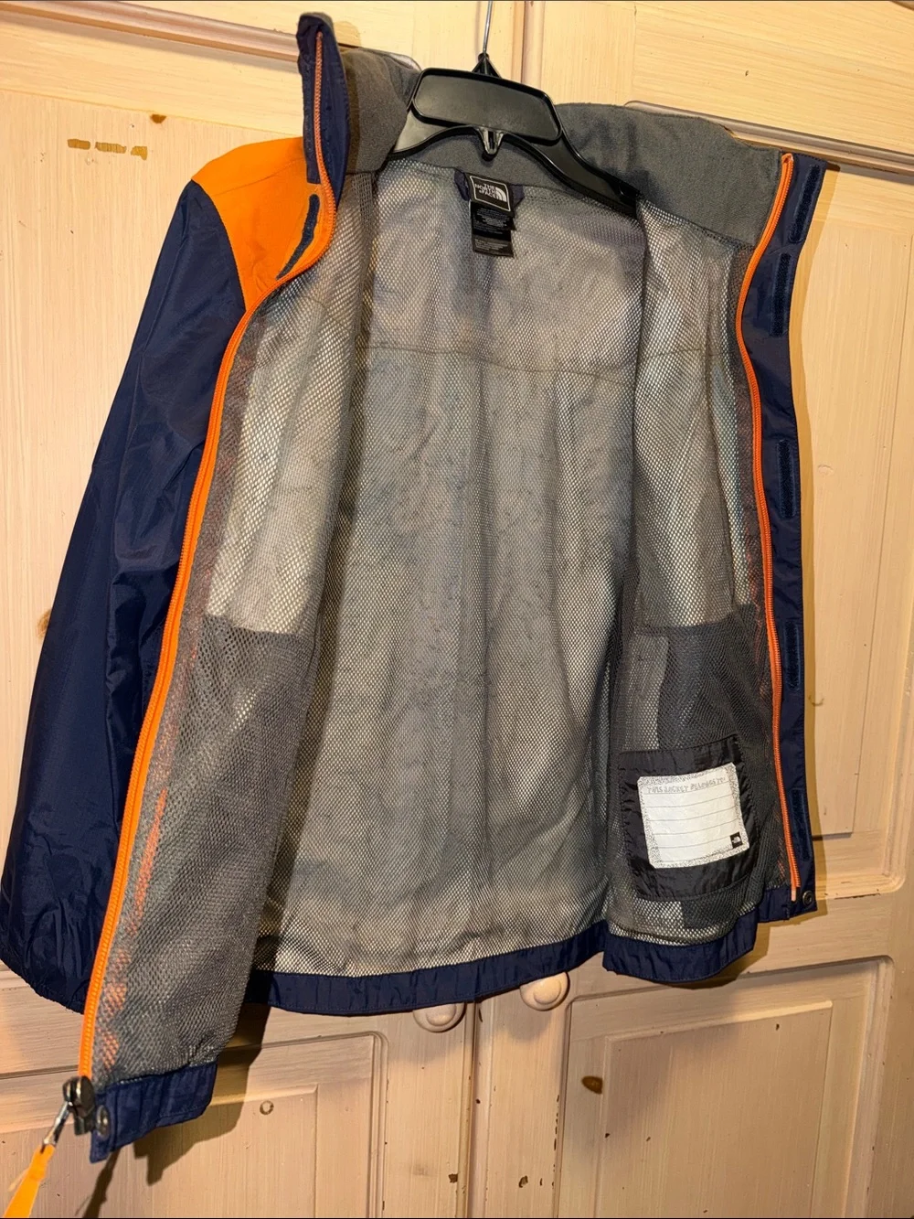 The North Face Kids Navy Blue and Orange Raincoat
